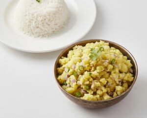 Assamese Aloo Pitika Recipe – Authentic Assamese Mashed Potato Dish 5 Assamese Aloo Pitika served with rice